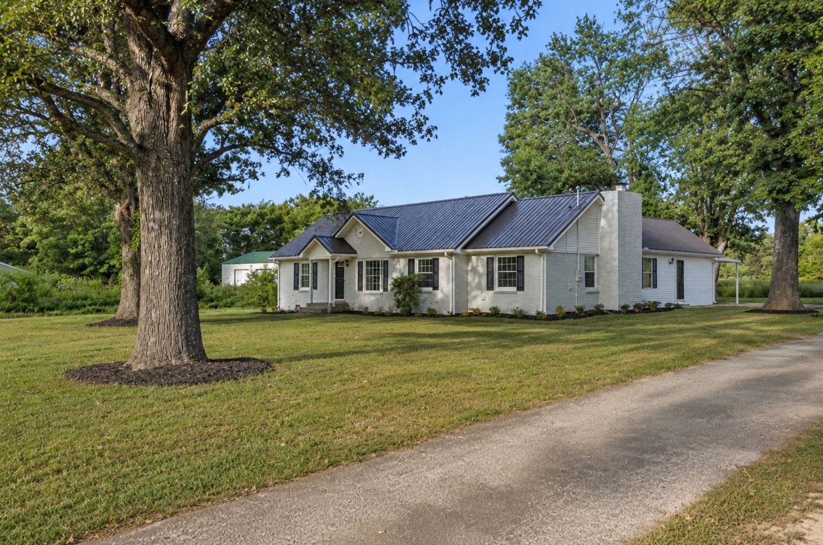 1083 Mattox Town Rd front exterior, Lawrence County TN home for sale