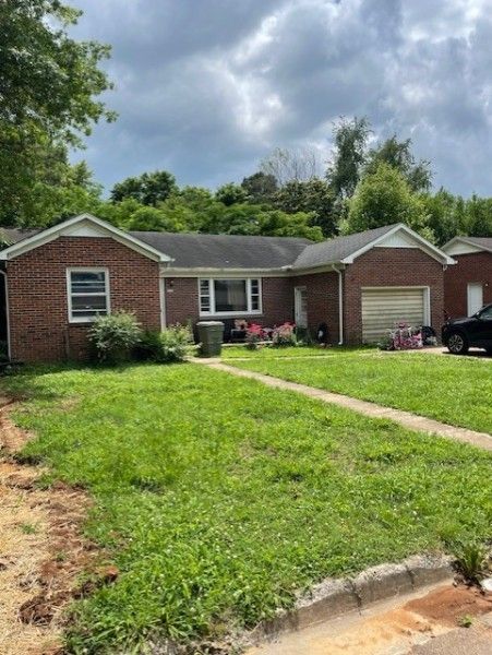 607 4th St front exterior, Lawrence County TN home for sale